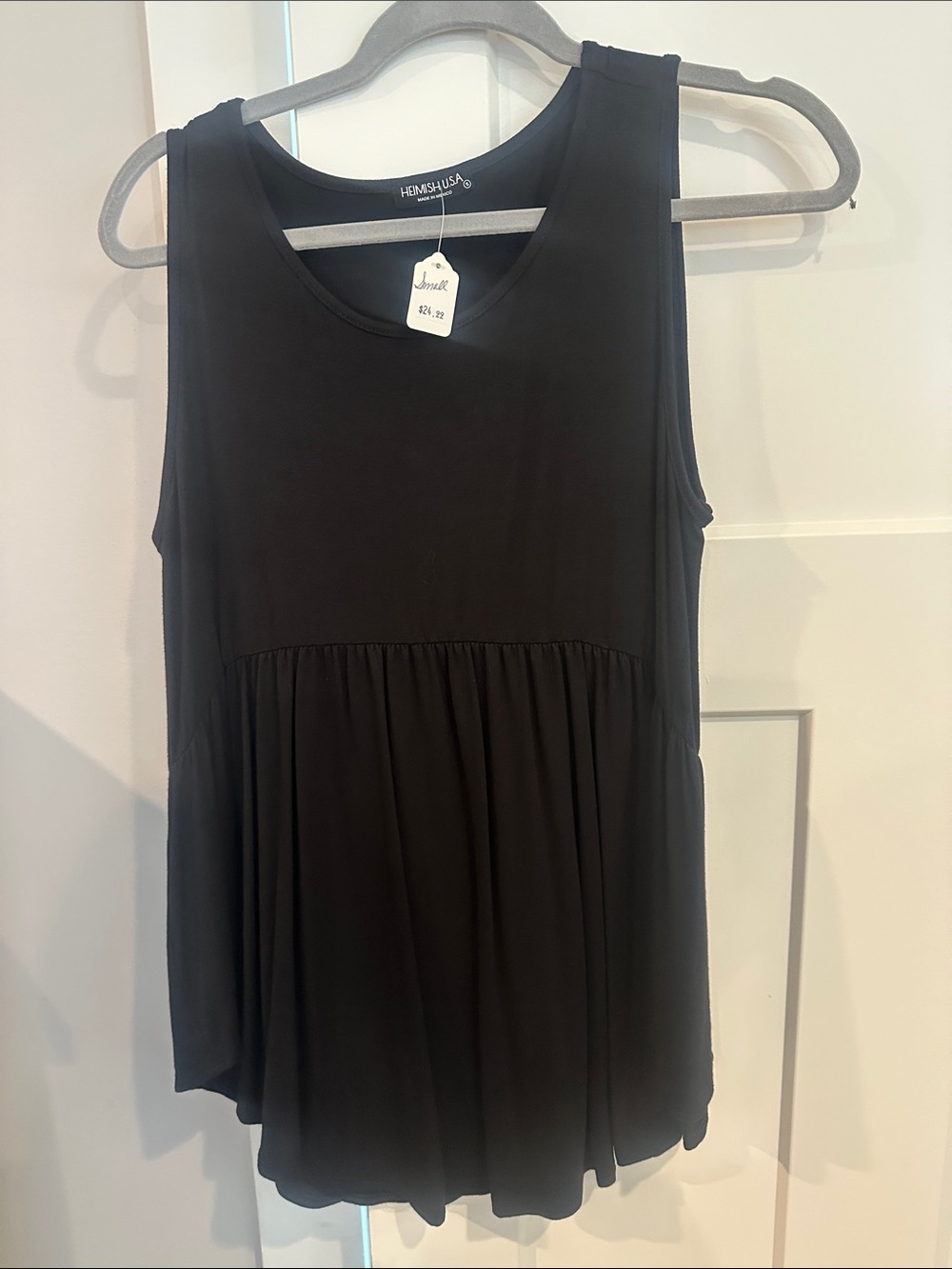 HEIMISH USA Black Sleeveless Peplum-Style Tank